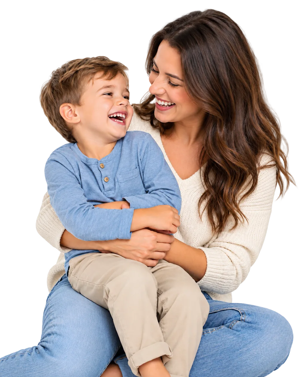 A mother holding her young son on her lap, the two of them laughing together